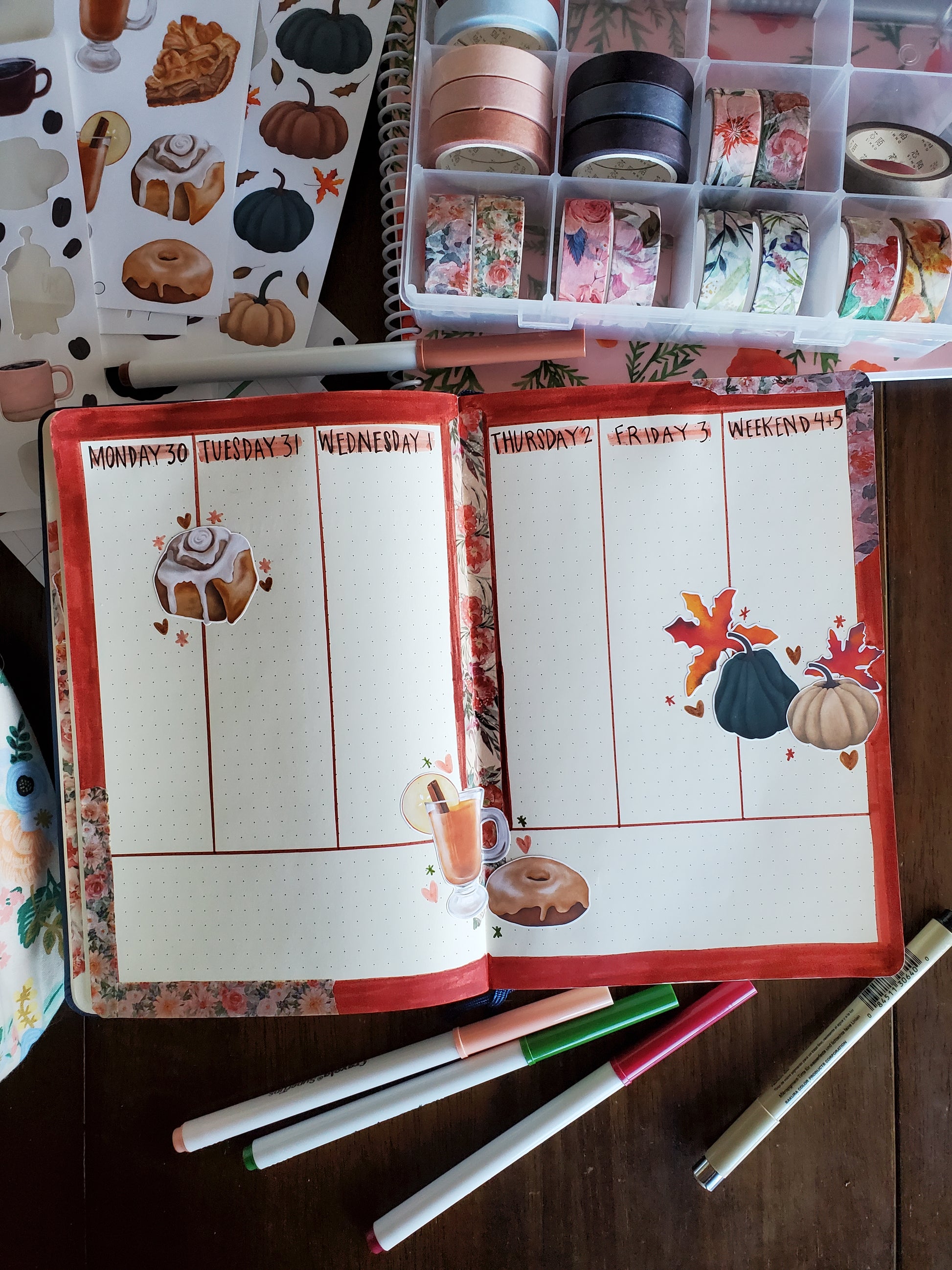 An example of a bullet journal weekly spread decorated with the Fall Delights sticker sheet bundle.