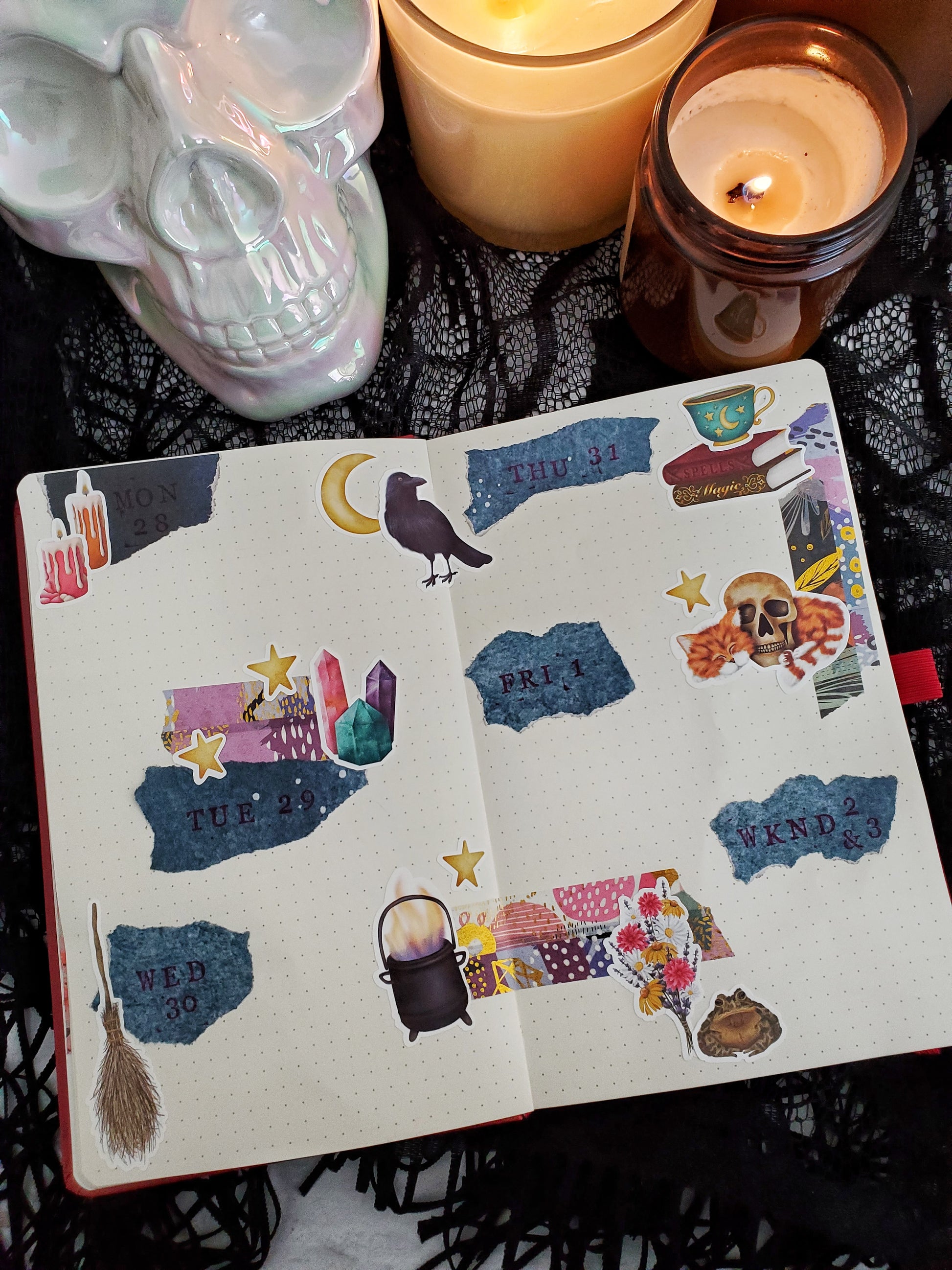 A journal spread decorated with the cottage witch sticker sheet. 